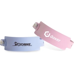 Two disposable PVC wristbands in light blue and pink, featuring logos on each band.