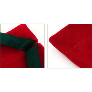 Red velvet drawstring gift bags with dark green ribbons and neat stitching details.