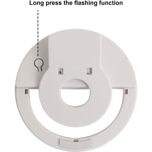 A white ring selfie light with a circular design and a small keyhole. It features a flashing function.