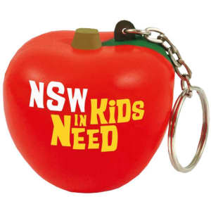 A red apple-shaped stress reliever with a keyring attachment. The apple features a green leaf and a logo.