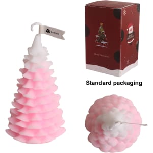Cedar Christmas tree shape candles in pink with a white top, packaged in festive Christmas-themed boxes.