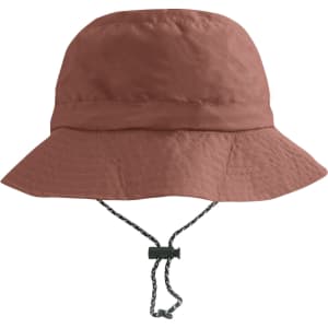 A foldable bucket hat in a rust colour, featuring a brim and an adjustable chin strap. It has a logo.