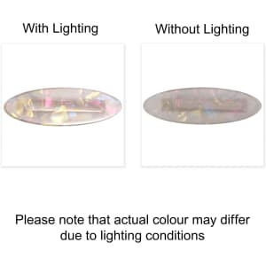 A teardrop-shaped iridescent alligator hair clip, displaying colour variations depending on lighting conditions.