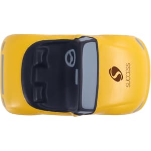 A yellow sports car-shaped stress reliever with a black top and a logo on the side.