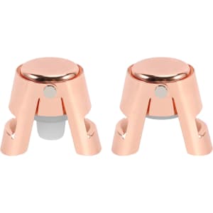 A stainless steel champagne stopper in rose gold, featuring a sleek design with a circular top and a silicone seal.