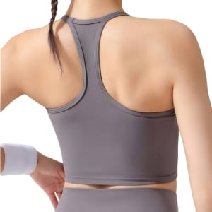 A grey women's seamless thin-strap racerback LYCRA yoga bra tank with a fitted design. It features a logo on the back.