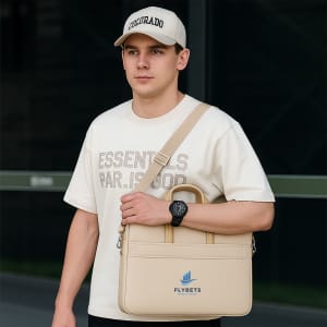 A beige sling laptop bag with a padded buffer pad, carried over the shoulder by a person in casual attire.