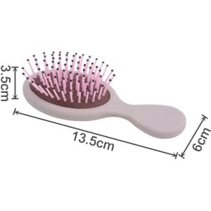 A mini paddle brush in soft pink and grey, featuring a rounded handle and flexible bristles.