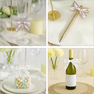 A collection of decorative Twist Tie Bows in white and pastel colours, tied around various table items and a drink bottle.