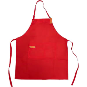A red poly-cotton canvas full bib apron with a neck strap and a front pocket. The apron features a logo.
