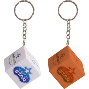 Two 3x3 puzzle cube keyrings, one in white with a logo and the other in orange, attached to metal keychains.