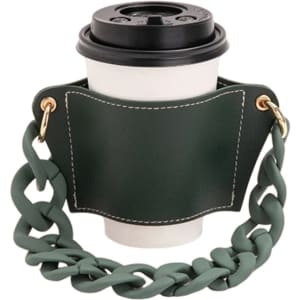A drink bottle holder in green leather with a chunky acrylic strap, designed to hold a coffee cup.