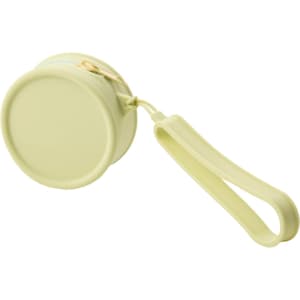 A round silicone coin pouch in a soft green shade with a zip closure and a wrist strap. It features a logo.