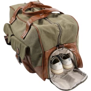 A vintage canvas duffle bag in green and brown with a separate compartment for shoes. Features leather accents and handles.