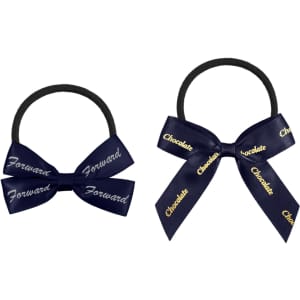 Two elastic hair bows in navy blue with ribbon detailing, featuring inscriptions in gold. One bow is larger than the other.