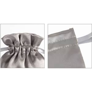 A grey silk satin drawstring bag with a gathered top and a smooth finish, featuring a drawstring closure.