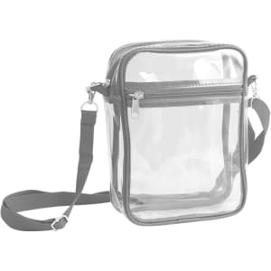A clear crossbody tote bag with a zipper closure, featuring a grey trim and an adjustable strap.