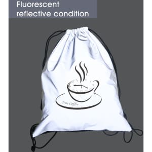 A fluorescent reflective drawstring bag with a coffee cup design in black on a light background.
