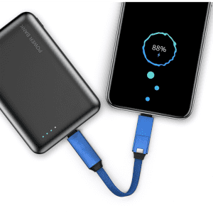 A black power bank with blue charging cable connected to a smartphone, displaying an 88% battery charge.