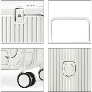 A white hardside suitcase with a locking mechanism, extendable handle, and wheels. Features a ribbed texture.