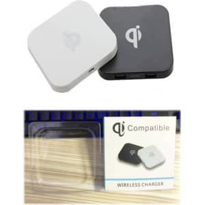 A square-shaped wireless charger in white and black, with a logo on the surface and packaged in a clear box.
