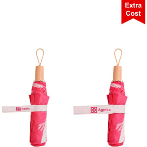 A lightweight pink umbrella with a wooden handle and a logo, secured with a fabric strap.