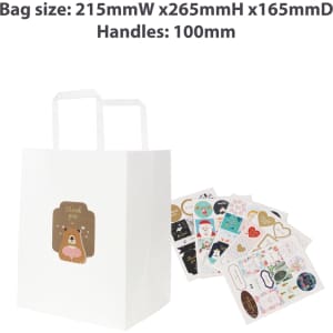 A white kraft paper bag with flat handles and assorted colourful stickers beside it.