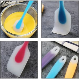 Silicone spatulas in various colours, including blue, pink, and purple, displayed with food and on a countertop.