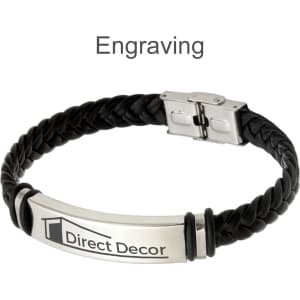 A black leather twine bracelet featuring a silver clasp and a logo engravings on a metal plate.