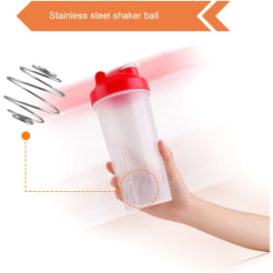 A drink bottle with a transparent body and red lid, featuring a stainless steel shaker ball inside.