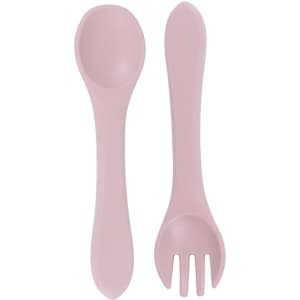 A pink silicone spoon and fork set for kids, featuring a smooth design and a slight curve, with a logo.