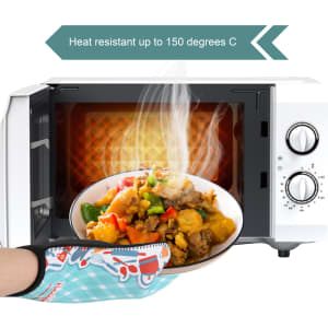 A neoprene oven mitt in a blue checkered pattern, protecting a hand while holding a bowl of steaming food from a microwave.