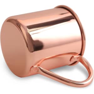 A copper Moscow Mule mug with a polished finish and a sturdy handle, featuring a round base.