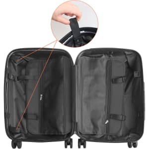 A black wheeled suitcase opened to display its interior compartments and straps, featuring a handle on the top.