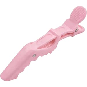 A pink anti-slip positioning alligator clip with textured grip and an ergonomic design, featuring a logo on one side.