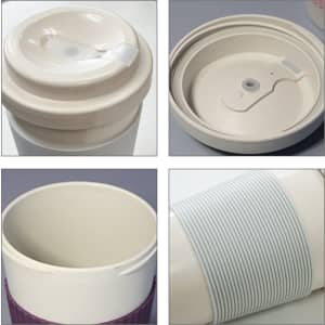 A coffee cup featuring a light beige body with a grey ribbed sleeve and a white lid, showcasing various angles and details.