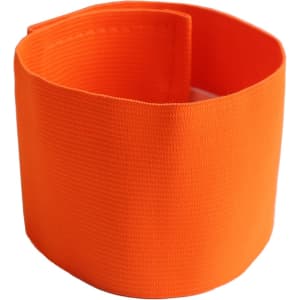 An orange stretchy armband, featuring a textured surface and a sleek design.