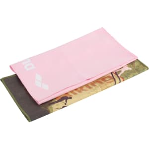 A pink quick dry towel layered over a camo-patterned towel, featuring a logo on the pink towel.