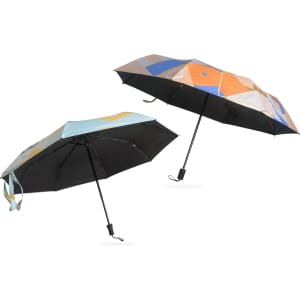 A folding umbrella in shades of blue and orange, featuring a unique design, with a black handle and a logo.