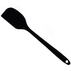 A black spatula with a flat head and a long handle, featuring a hole for hanging.