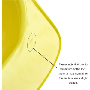 A mini yellow PVC construction hat with a slight crease, featuring a logo or branding.