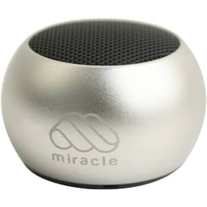 A silver Mini Bass Wireless Speaker with a rounded shape and a mesh top, featuring a logo on the front.