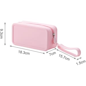 A pink silicone square cosmetic bag with a zip closure and a wrist strap, measuring 18.3 cm by 7 cm by 9.3 cm.