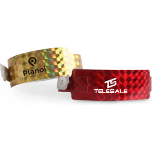 Two disposable holographic PVC wristbands, one in gold with a logo and the other in red with a logo.