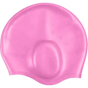 A pink swimming cap with built-in earmuffs, featuring a smooth, streamlined design and logo branding.