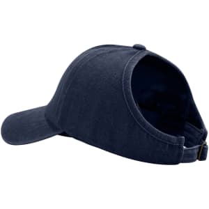 A navy Ponytail Top Hat with an open back for ponytails, featuring a curved visor and a logo.