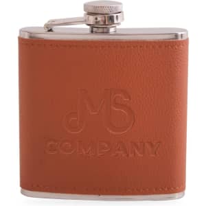 A drink bottle with a stainless steel cap, wrapped in brown leather, featuring an embossed logo.