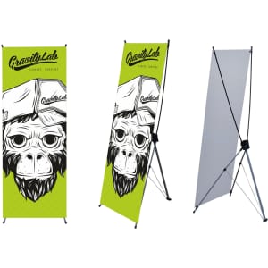 A small x-frame banner featuring a green background with a monkey illustration and a logo. The banner is set up with support legs.