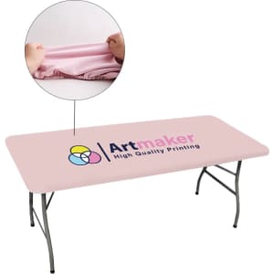 A pink rectangle table topper on a folding table, featuring a brand logo. It has a fitted design for easy use.