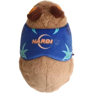 A soft brown wombat plush toy wearing a blue band with a logo. It features detailed facial features and textures.